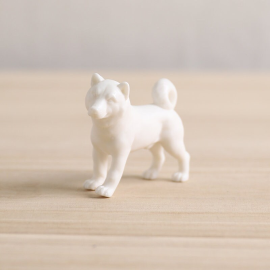 The White Porcelain Dog Tea Pet