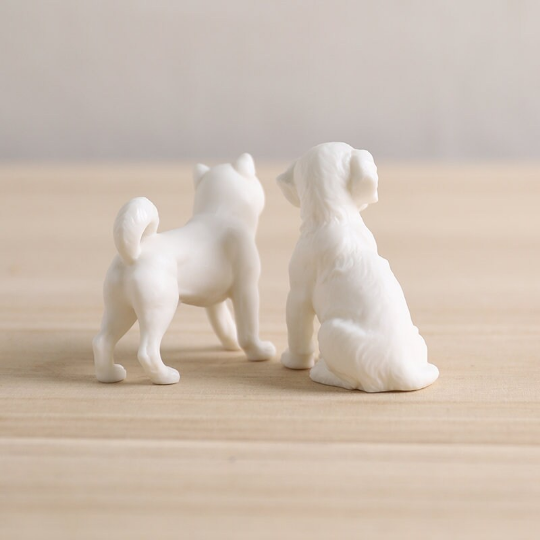 The White Porcelain Dog Tea Pet