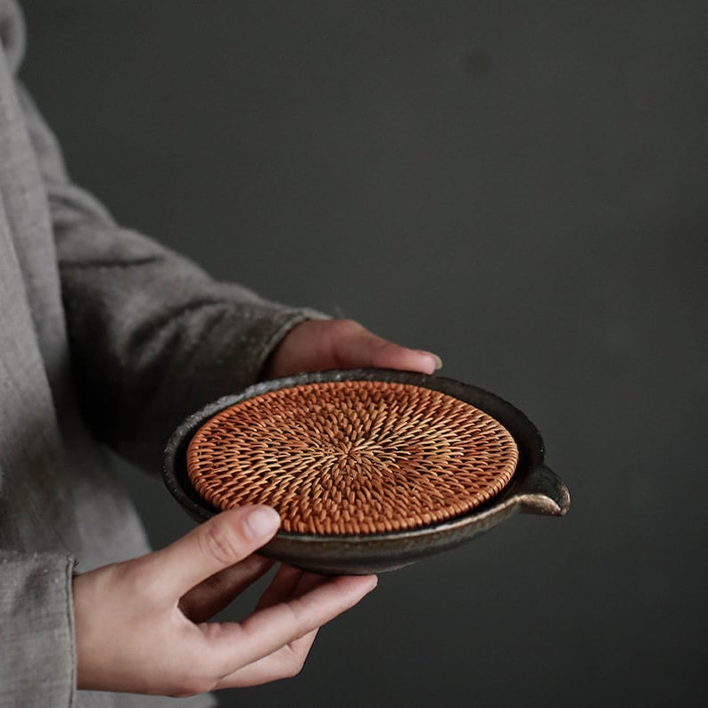 Japanese Woven Rattan and Rustic Ceramic Teapot Holder